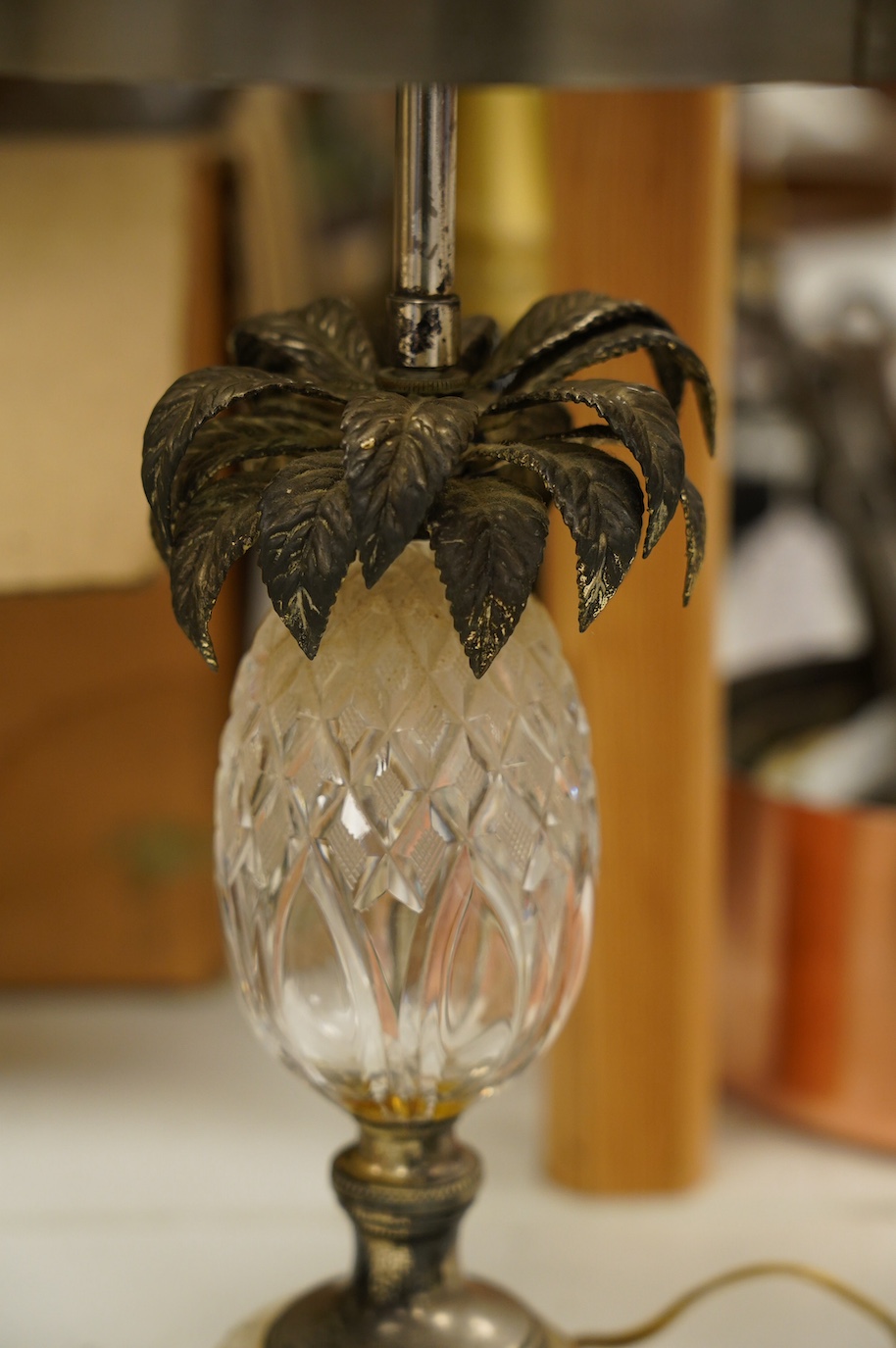 A silver plated and cut glass 'pineapple' lamp with metal shade, 48cm high. Condition - fair to good, some loss to plating etc.